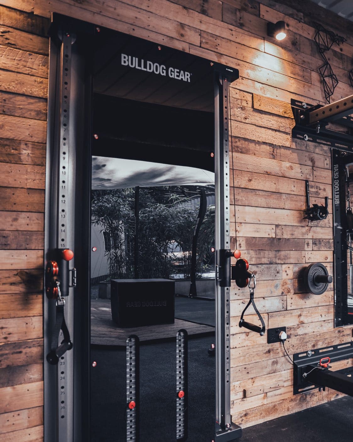 The studio's sliding door, open to the outdoor training area